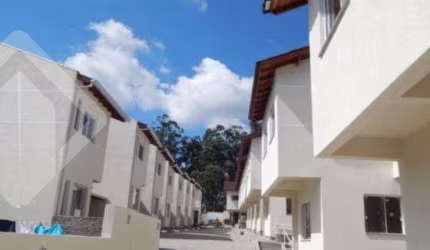 Casa em condomínio fechado com 3 quartos à venda na Avenida Prefeito Barreto Viana, 413, Santa Cecília, Viamão, 71 m2 por R$ 194.900