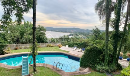 Casa com 4 quartos à venda na Rua Charruas, 160, Espírito Santo, Porto Alegre, 1000 m2 por R$ 2.640.000
