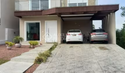 Casa em condomínio fechado com 3 quartos à venda na Avenida Senador Salgado Filho, 8500, Jardim Krahe, Viamão, 200 m2 por R$ 1.800.000