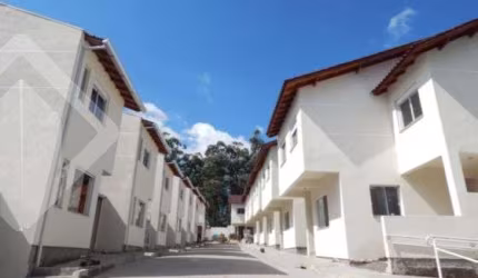 Casa em condomínio fechado com 3 quartos à venda na Avenida Prefeito Barreto Viana, 413, Santa Cecília, Viamão, 71 m2 por R$ 265.000