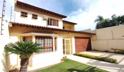 Casa com 4 quartos à venda na Rua Alfredo Silveira Dias, 15, Nonoai, Porto Alegre, 350 m2 por R$ 1.080.000