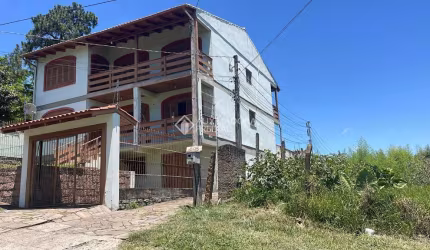 Casa com 1 quarto à venda na Rua Taveira Júnior, 471, Nonoai, Porto Alegre, 2500 m2 por R$ 1.200.000