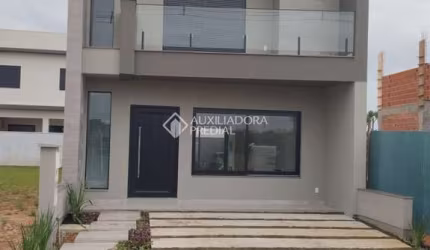 Casa em condomínio fechado com 3 quartos à venda na Avenida Centenário, 1011, Passo das Pedras, Gravataí, 142 m2 por R$ 850.000