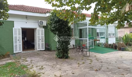 Casa com 5 quartos à venda na Avenida Cinco de Novembro, 56, Teresópolis, Porto Alegre, 250 m2 por R$ 1.350.000