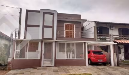 Casa com 3 quartos à venda na Rua Alfredo Varela, 212, Teresópolis, Porto Alegre, 240 m2 por R$ 1.300.000