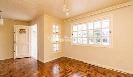 Casa em condomínio fechado com 4 quartos à venda na Avenida Delmar Rocha Barbosa, 371, Parque Santa Fé, Porto Alegre, 215 m2 por R$ 456.000