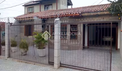 Casa em condomínio fechado com 2 quartos à venda na Rua José Pedro de Souza, 30, Vila Nova, Porto Alegre, 170 m2 por R$ 430.000