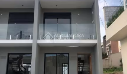 Casa em condomínio fechado com 2 quartos à venda na Rua Heitor Kramer, 704, Guarujá, Porto Alegre, 100 m2 por R$ 475.000