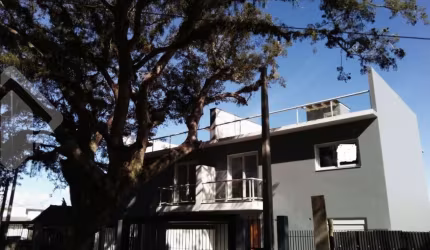 Casa em condomínio fechado com 3 quartos à venda na Rua Jacundá, 80, Guarujá, Porto Alegre, 159 m2 por R$ 586.000