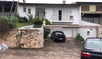 Casa com 3 quartos à venda na Rua Araponga, 174, Chácara das Pedras, Porto Alegre, 247 m2 por R$ 1.900.000