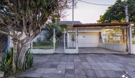 Casa com 3 quartos à venda na Rua Delfino Riet, 287, Santo Antônio, Porto Alegre, 322 m2 por R$ 1.300.000