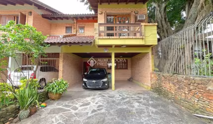Casa com 3 quartos à venda na Rua José Kanan Aranha, 277, Jardim Isabel, Porto Alegre, 176 m2 por R$ 795.000