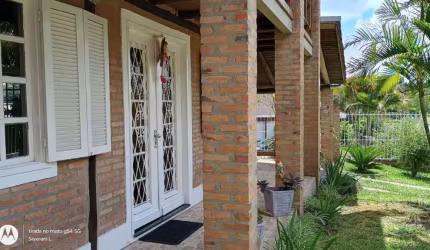 Casa em condomínio fechado com 4 quartos à venda na Rua Mogno, 24, Cantegril, Viamão, 190 m2 por R$ 550.000