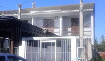 Casa com 2 quartos à venda na Rua Maria Onofrina Mendonça Torres, 104, Mário Quintana, Porto Alegre, 76 m2 por R$ 319.000