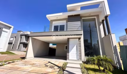 Casa em condomínio fechado com 3 quartos à venda na Rua dos Pinheiros, 141, Igara, Canoas, 228 m2 por R$ 1.950.000