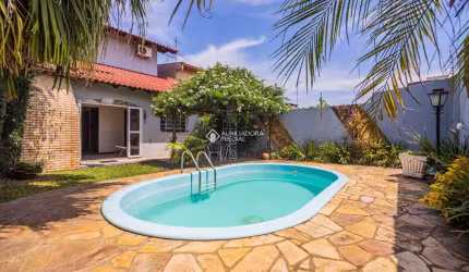 Casa com 4 quartos à venda na Rua Machado de Assis, 80, Vila Olímpica, Esteio, 241 m2 por R$ 807.500