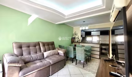 Casa em condomínio fechado com 3 quartos à venda na Rua República, 2708, Harmonia, Canoas, 88 m2 por R$ 436.000