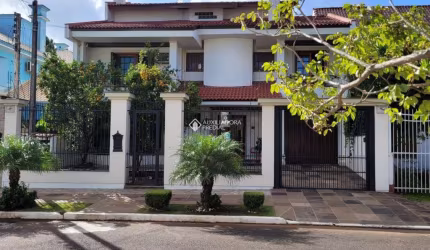 Casa com 6 quartos à venda na Rua Irmão Agnelo Chaves, 170, Marechal Rondon, Canoas, 448 m2 por R$ 1.730.000