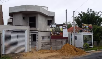 Casa em condomínio fechado com 3 quartos à venda na Rua Buttenbender, 296, Fátima, Canoas, 147 m2 por R$ 469.900