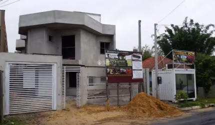 Casa em condomínio fechado com 3 quartos à venda na Rua Buttenbender, 296, Fátima, Canoas, 147 m2 por R$ 489.900