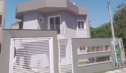 Casa em condomínio fechado com 3 quartos à venda na Rua Buttenbender, 296, Fátima, Canoas, 130 m2 por R$ 499.900