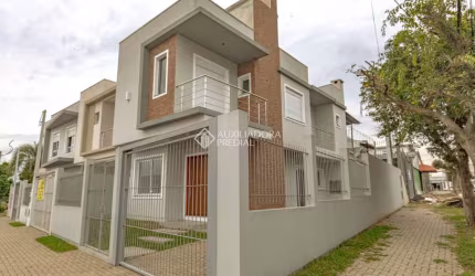 Casa com 3 quartos à venda na Rua Érico Veríssimo, 53, Nossa Senhora das Graças, Canoas, 132 m2 por R$ 780.000