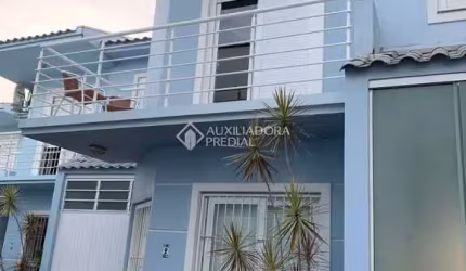 Casa com 2 quartos à venda na Rua Doutor Tancredo Neves, 312, Fátima, Canoas, 93 m2 por R$ 425.000