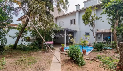 Casa em condomínio fechado com 3 quartos à venda na Rua das Bromélias, 247, Estância Velha, Canoas, 135 m2 por R$ 850.000