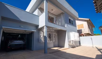 Casa com 4 quartos à venda na Rua das Araucárias, 219, Harmonia, Canoas, 350 m2 por R$ 650.000