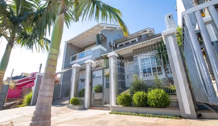 Casa com 3 quartos à venda na Rua Dinamarca, 268, Marechal Rondon, Canoas, 276 m2 por R$ 1.650.000