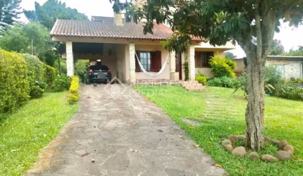 Casa em condomínio fechado com 3 quartos à venda na Rua Maximiliano José Bernardes, 244, Cecília, Viamão, 198 m2 por R$ 720.000