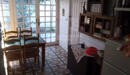 Casa em condomínio fechado com 2 quartos à venda na Rua Jorge Amado, 52, Harmonia, Canoas, 84 m2 por R$ 306.000