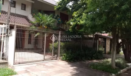 Casa em condomínio fechado com 3 quartos à venda na Rua Coronel Ricardo Machado, 79, Marechal Rondon, Canoas, 350 m2 por R$ 1.472.500