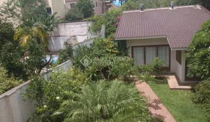 Casa em condomínio fechado com 3 quartos à venda na Rua Coronel Ricardo Machado, 79, Marechal Rondon, Canoas, 350 m2 por R$ 1.350.000