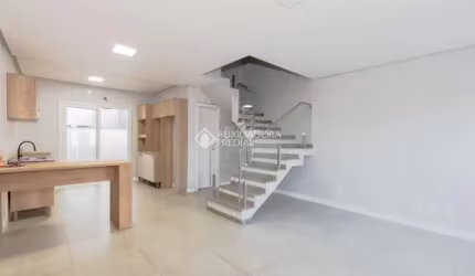 Casa em condomínio fechado com 3 quartos à venda na Rua Doutor João César, 374, Estância Velha, Canoas, 108 m2 por R$ 640.000