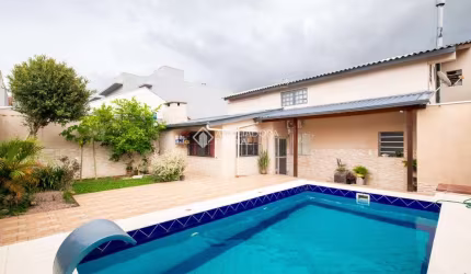 Casa em condomínio fechado com 4 quartos à venda na Rua das Petúnias, 725, Estância Velha, Canoas, 298 m2 por R$ 954.000