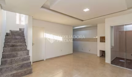 Casa em condomínio fechado com 3 quartos à venda na Rua Antônio Lourenço Rosa, 225, Mato Grande, Canoas, 98 m2 por R$ 379.050