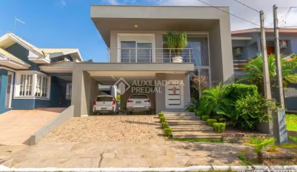 Casa em condomínio fechado com 3 quartos à venda na Avenida Farroupilha, 6900, Igara, Canoas, 220 m2 por R$ 2.080.000