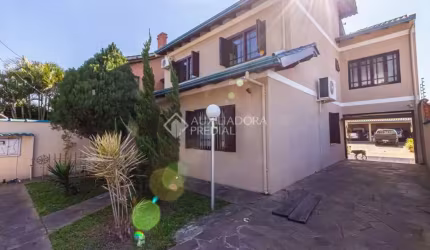Casa em condomínio fechado com 3 quartos à venda na Rua Boa Esperança, 1145, Rio Branco, Canoas, 243 m2 por R$ 1.064.000