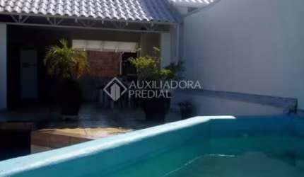 Casa em condomínio fechado com 3 quartos à venda na Rua Marco Aurélio Hidalgo, 17, Nossa Senhora das Graças, Canoas, 173 m2 por R$ 850.000