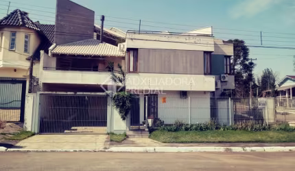 Casa em condomínio fechado com 3 quartos à venda na Rua Marco Aurélio Hidalgo, 17, Nossa Senhora das Graças, Canoas, 173 m2 por R$ 850.000