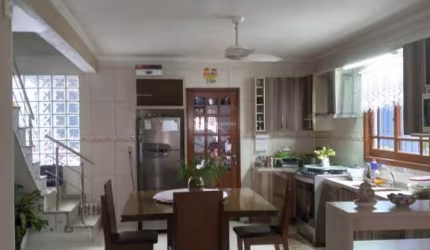 Casa em condomínio fechado com 3 quartos à venda na Rua Cacilda Becker, 54, Harmonia, Canoas, 213 m2 por R$ 429.000