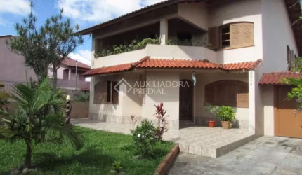 Casa em condomínio fechado com 3 quartos à venda na Rua Tamoio, 2292, Niterói, Canoas, 240 m2 por R$ 950.000