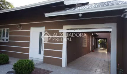 Casa em condomínio fechado com 6 quartos à venda na Rua Quinze de Novembro, 143, Nossa Senhora das Graças, Canoas, 220 m2 por R$ 690.000