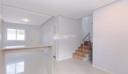 Casa em condomínio fechado com 3 quartos à venda na Rua Santa Terezinha, 477, Nossa Senhora das Graças, Canoas, 100 m2 por R$ 460.000