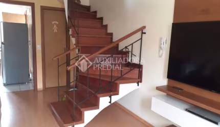 Casa em condomínio fechado com 2 quartos à venda na Rua Pistoia, 830, Rio Branco, Canoas, 67 m2 por R$ 298.000