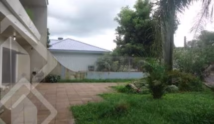 Casa em condomínio fechado com 5 quartos à venda na Rua Santa Terezinha, 286, Nossa Senhora das Graças, Canoas, 372 m2 por R$ 750.000