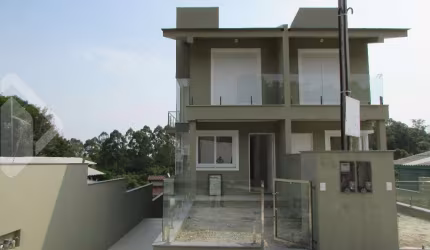 Casa em condomínio fechado com 3 quartos à venda na B, 451, Centro, Nova Santa Rita, 130 m2 por R$ 499.000