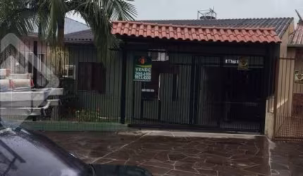Casa em condomínio fechado com 3 quartos à venda na Rua Brasil, 611, Harmonia, Canoas, 100 m2 por R$ 583.000