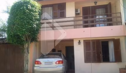 Casa em condomínio fechado com 2 quartos à venda na Avenida Juca Batista, 1490, Belém Novo, Porto Alegre, 123 m2 por R$ 600.000